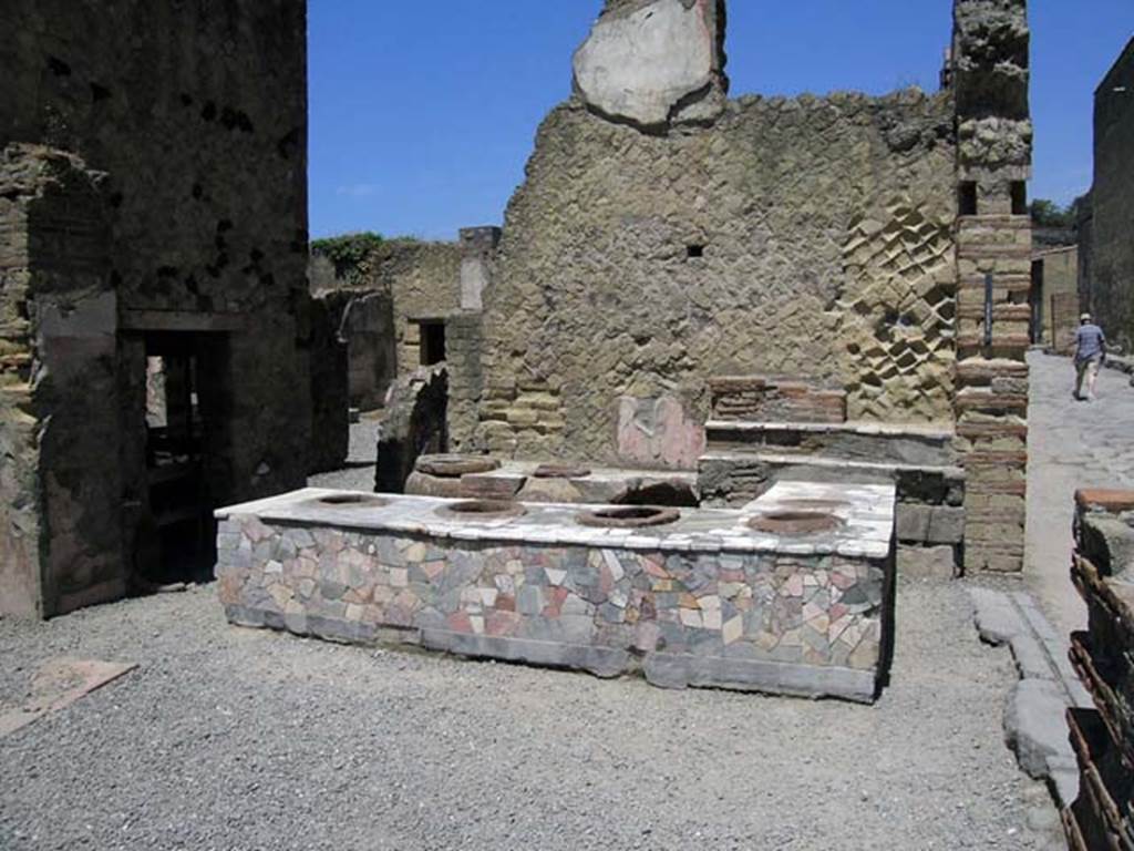 IV.16, Herculaneum, May 2006. General view looking west across shop-room, with IV.15 entrance on right.
Photo courtesy of Nicolas Monteix.